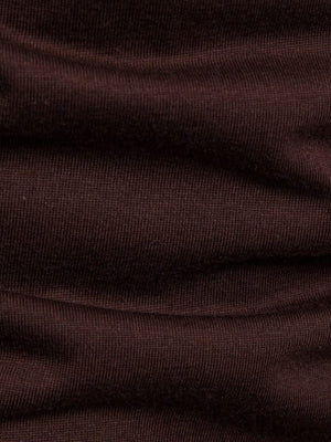Brown cotton t-shirt with ribbed texture and asymmetric hem detail.