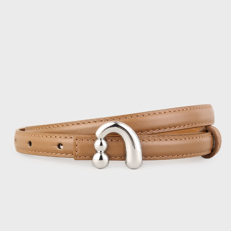 Caramel skinny leather belt with a modern silver buckle and double ball detail.
