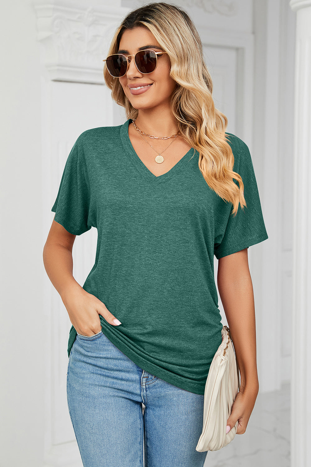 Dark Green V-neck tee with short dolman sleeves and subtle side ruching.