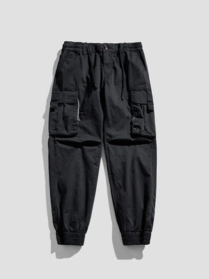 Black cargo joggers with flap pockets and elastic cuffs.