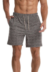 Geometric print boardshorts in black with drawstring waist and side pockets.