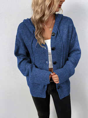 Button-front hooded knit cardigan in dark blue with black buttons and drawstring hood.