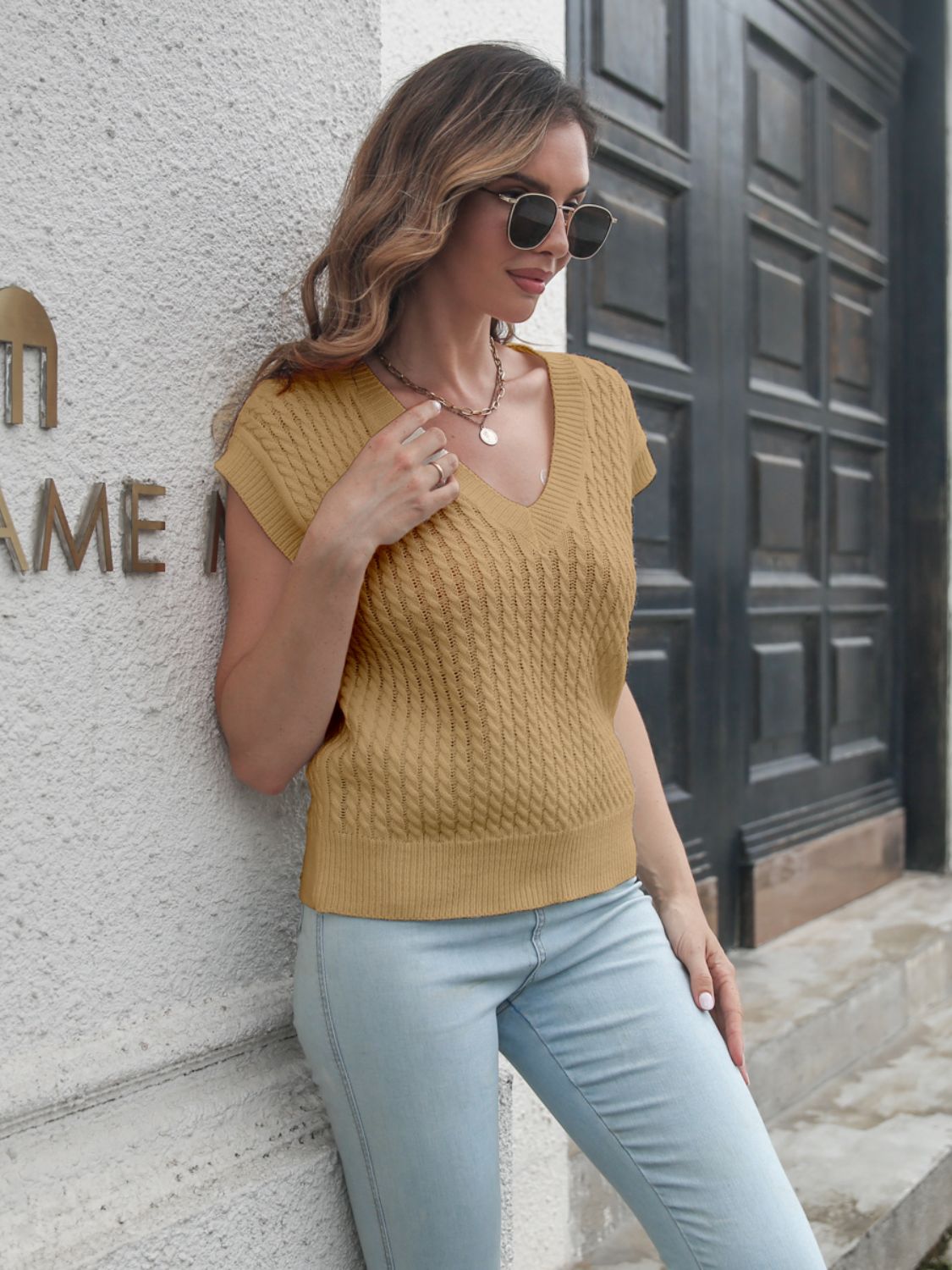 Khaki cable knit V-neck sleeveless sweater top with textured pattern
