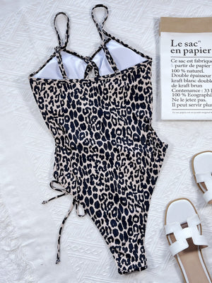 Leopard print one-piece swimsuit with cutout sides and lace-up detail