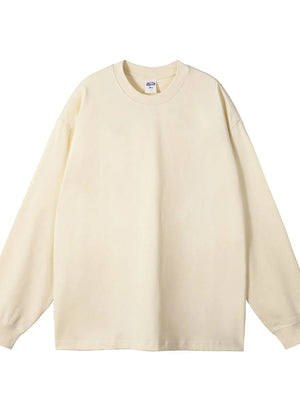Oversized crewneck pullover in beige, 100% cotton, with drop shoulders and long sleeves.