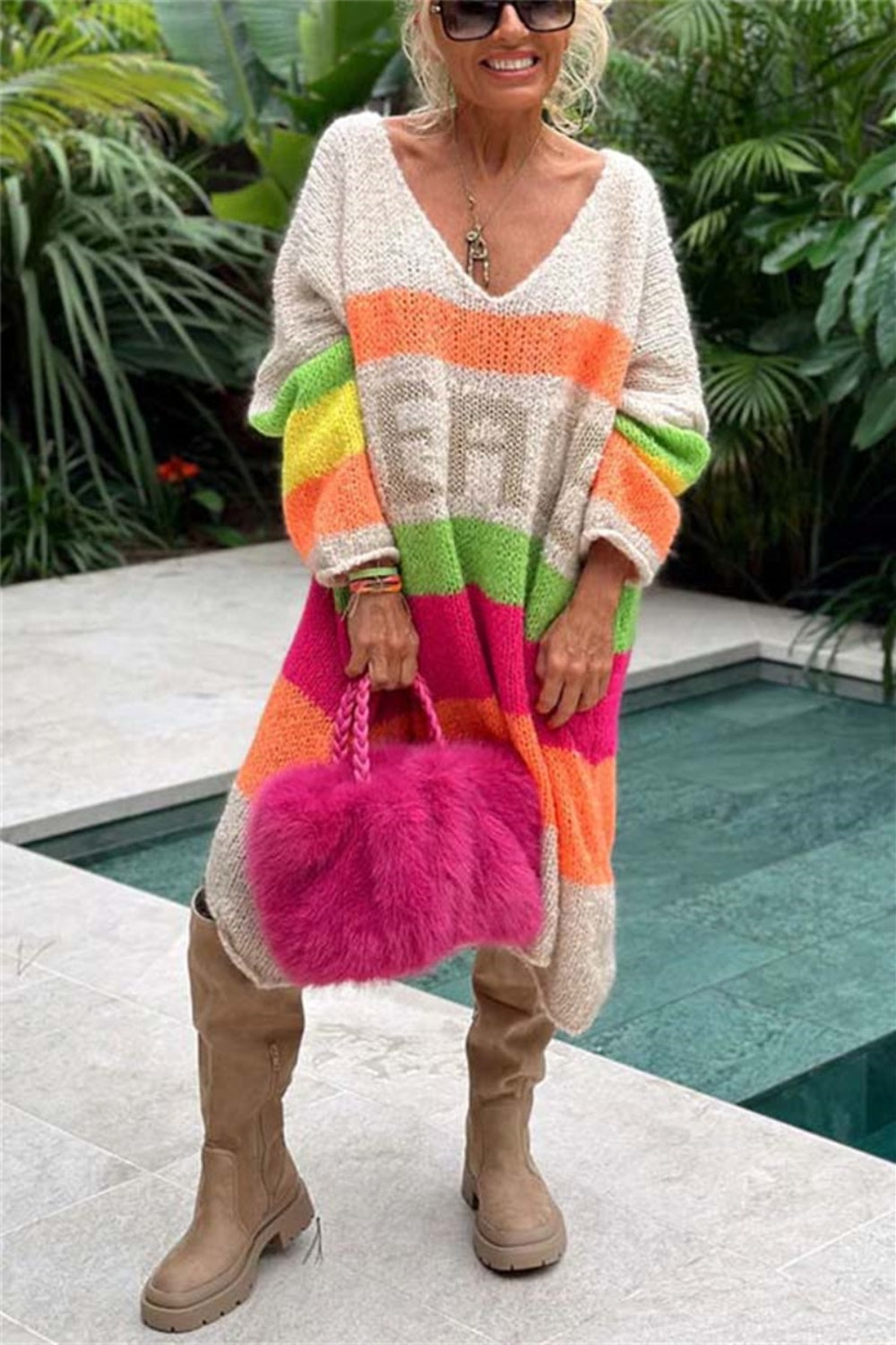Beige knit midi sweater dress with rainbow stripes and V-neck.