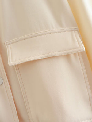 Cream utility pocket bomber jacket with button detail