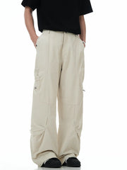 Men's beige cargo pants with multiple pockets and a relaxed fit.