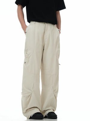 Men's beige cargo pants with multiple pockets and a relaxed fit.