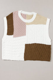 Patchwork cable knit tank top in dusty pink, white, brown, and tan with mixed stitch patterns.