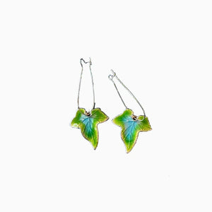 Verdant enamel ivy drop earrings in green and blue with gold trim.