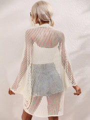 White open-weave kimono duster with batwing sleeves and a breathable acrylic knit.