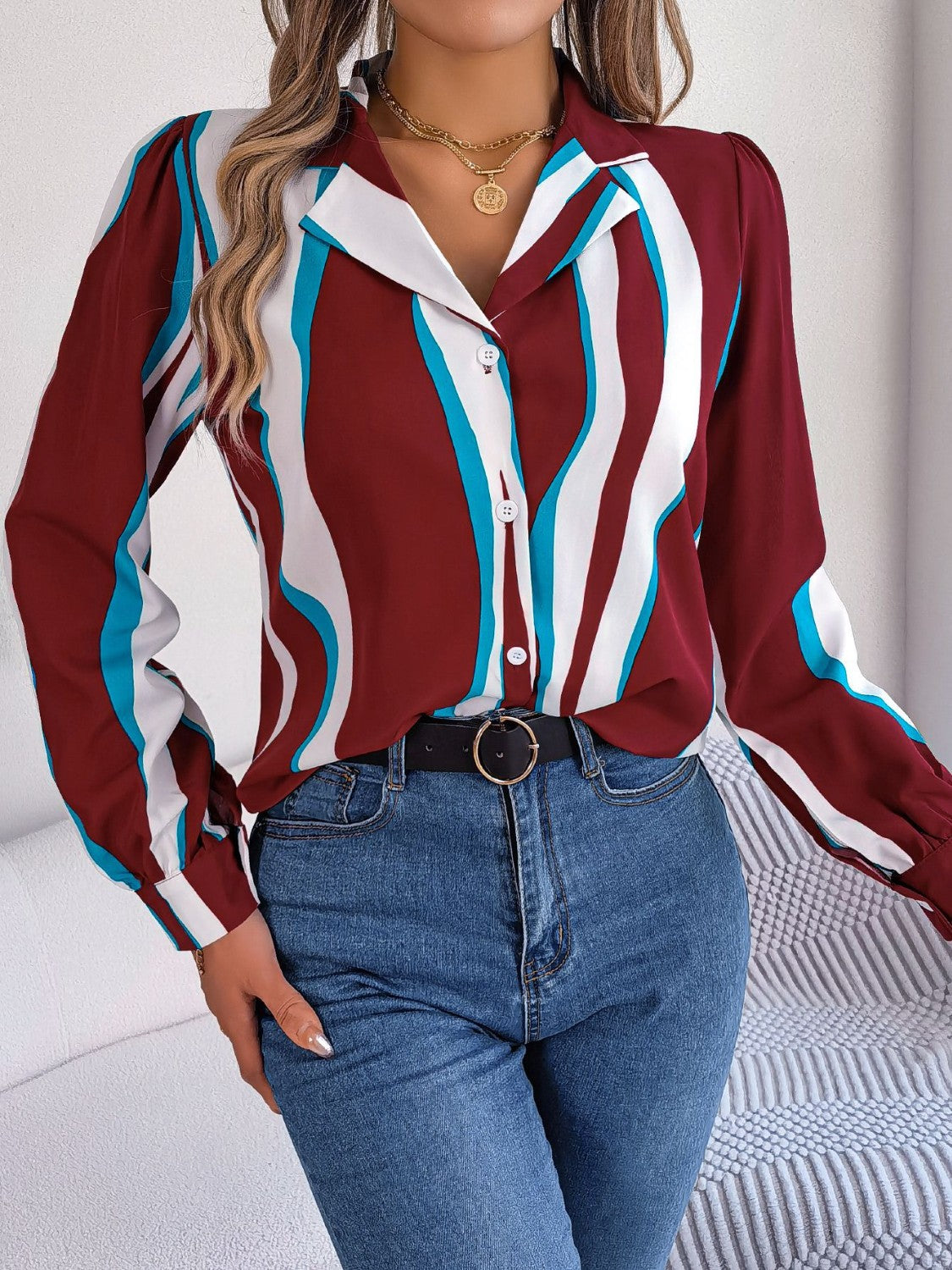 Burgundy wavy stripe collared blouse with white and blue accents, button front, long sleeves.