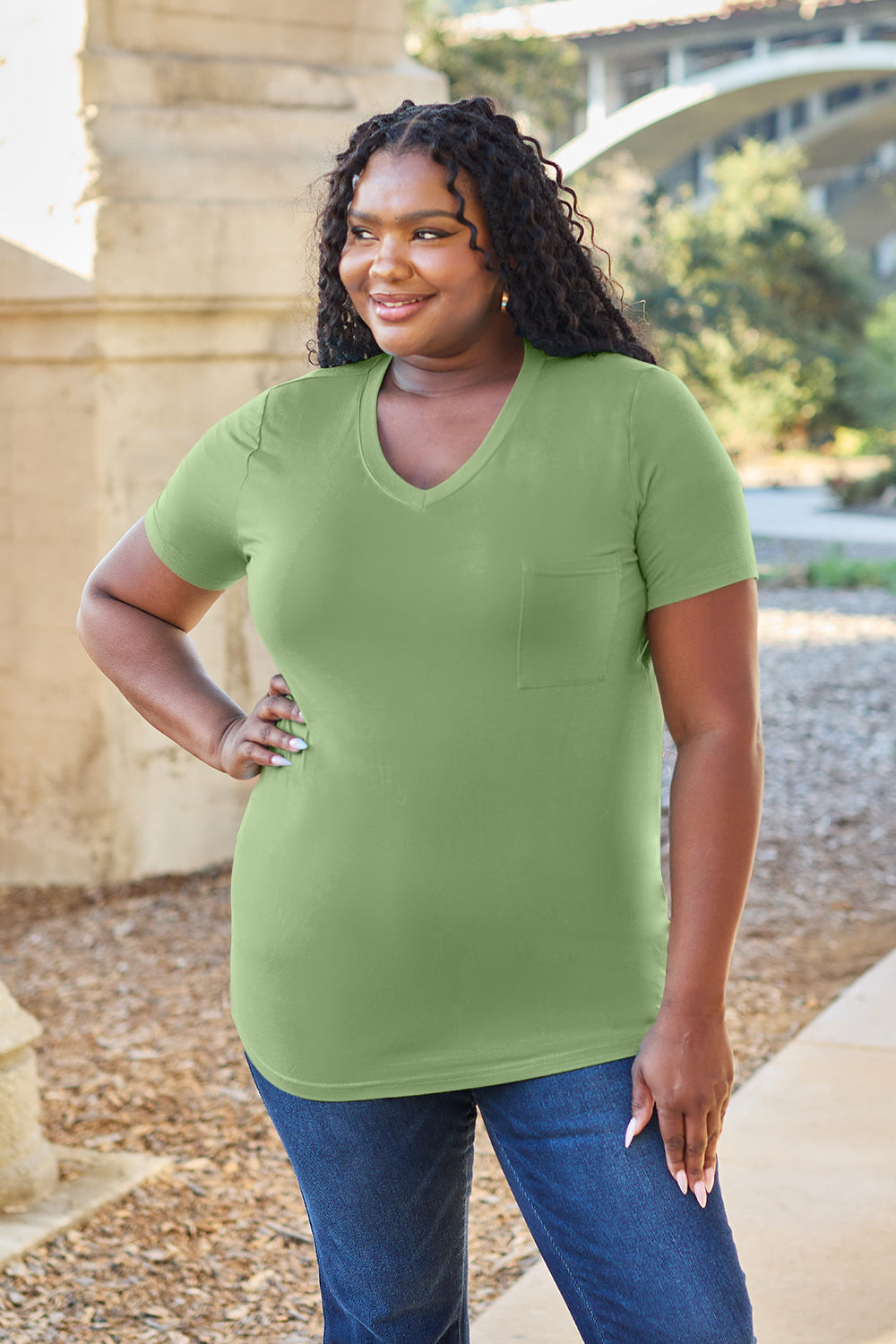 Matcha green V-neck t-shirt with short sleeves and a chest pocket.