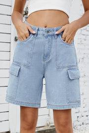 Medium wash denim utility shorts with large cargo pockets and contrast stitching.