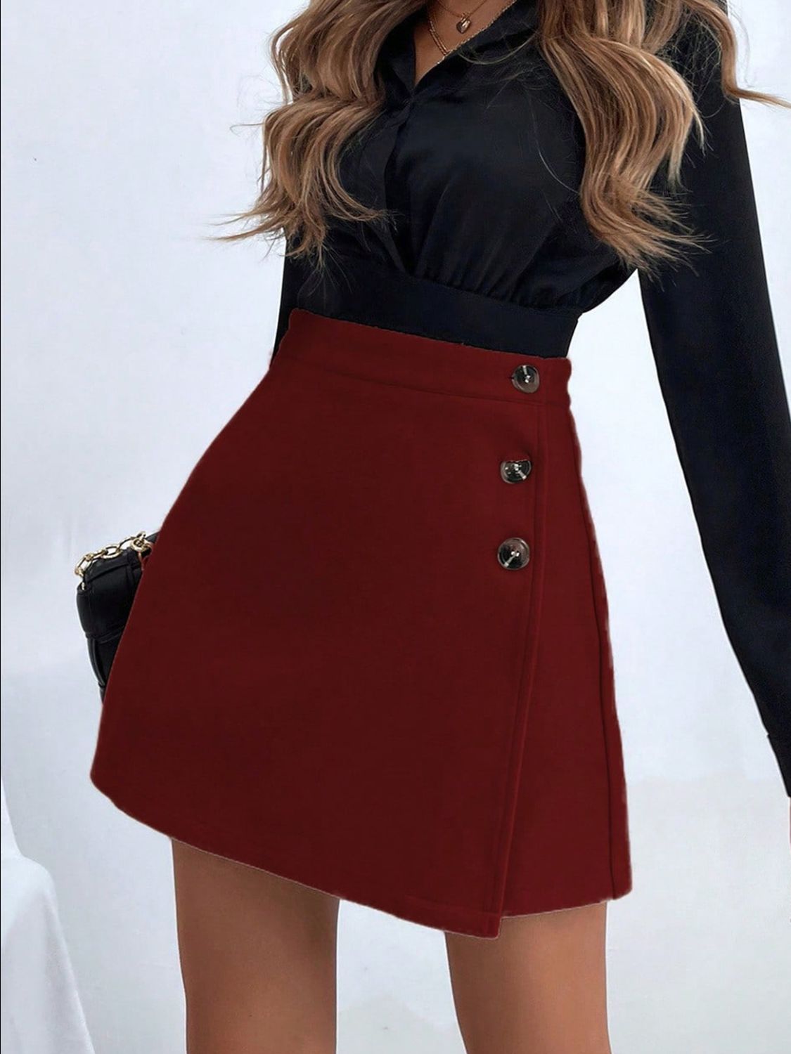 Burgundy asymmetric mini skirt with button detail