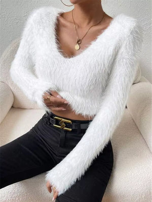 Cozy fluffy white v-neck knit sweater with long sleeves