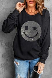 Black sweatshirt with rhinestone wink-star smiley face graphic