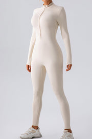 White zip-front bodycon jumpsuit with long sleeves and mock neck
