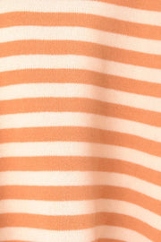 Sunset Stripe Colorblock Cuff Sweater in cream with horizontal orange stripes, acrylic knit.