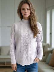 Textured cable knit mock neck pullover sweater in light purple with intricate cable detailing.