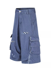Blue faded cargo capris with distressed detailing and plaid accents.