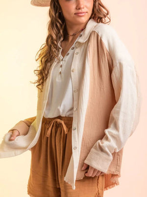 Colorblock gauze shirt jacket in apricot and cream with button front and raw hem.