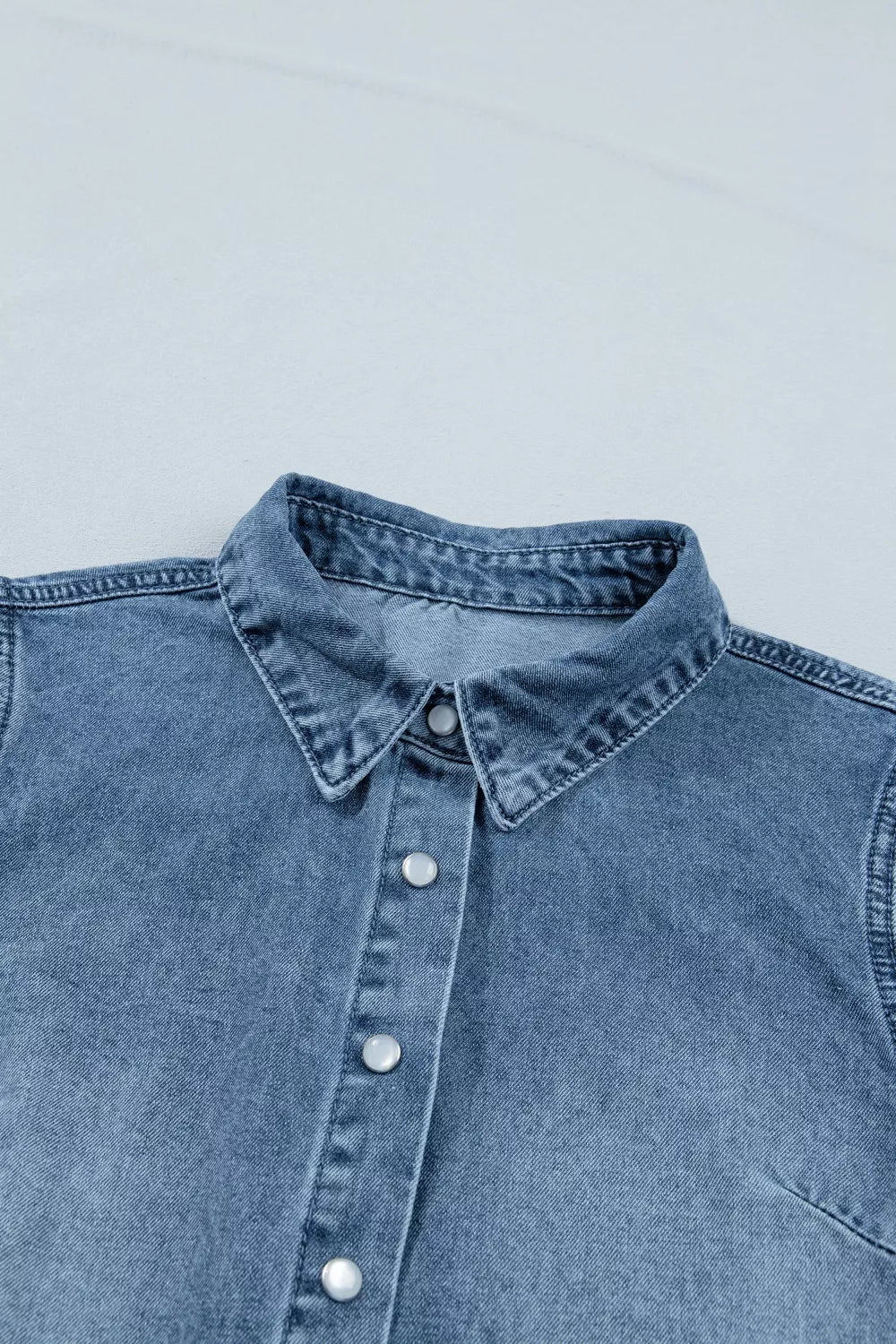 Chic frilled denim shirt with snap closure, collar detail