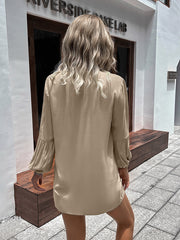 Oversized khaki blouse with mandarin collar and balloon sleeves