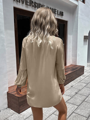 Oversized khaki blouse with mandarin collar and balloon sleeves