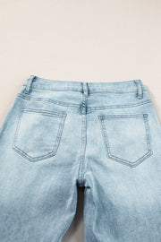 High-waisted palazzo flare denim jeans in medium wash with back pockets