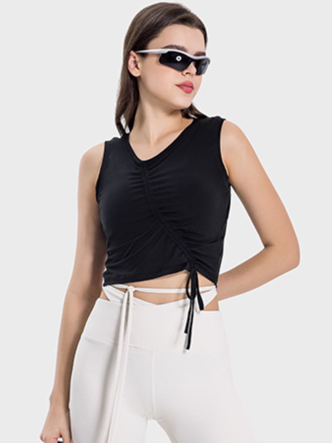 Black asymmetric ruched crop tank top with V-neck and drawstring detail