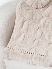 Eggshell cable knit poncho with faux fur trim and detailed hem