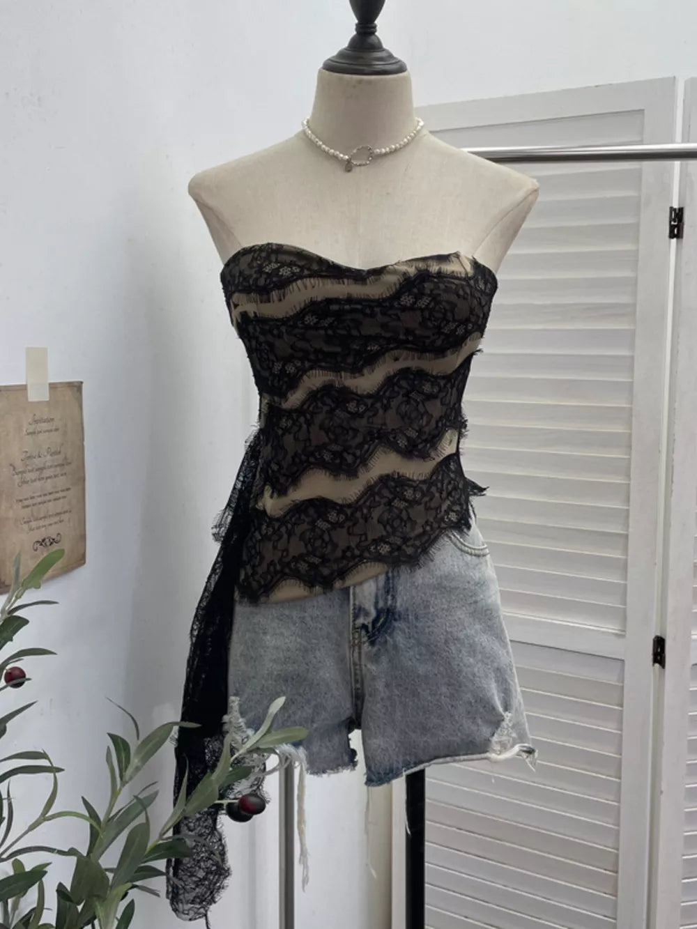 Lace Tube Top With Asymmetrical Hem in Black, front view