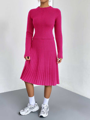 Hot Pink ribbed knit fit-and-flare co-ord with a mock neck and pleated skirt.