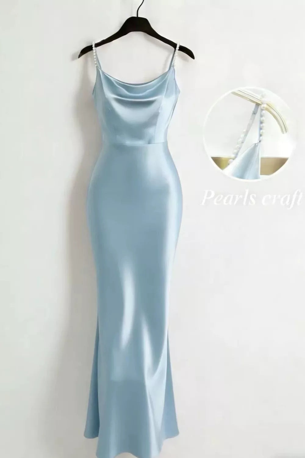 Light blue satin cowl neck maxi dress with pearl-embellished straps.