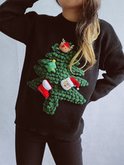 Black acrylic knit sweater with a 3D Christmas tree embellishment featuring Santa, a reindeer, and stockings.