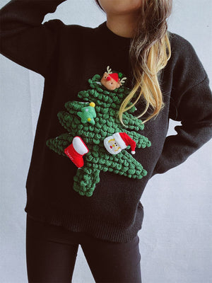 Black acrylic knit sweater with a 3D Christmas tree embellishment featuring Santa, a reindeer, and stockings.