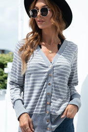 Button-front cardigan in Cloudy Blue with white stripes, ribbed trim, and gold buttons.