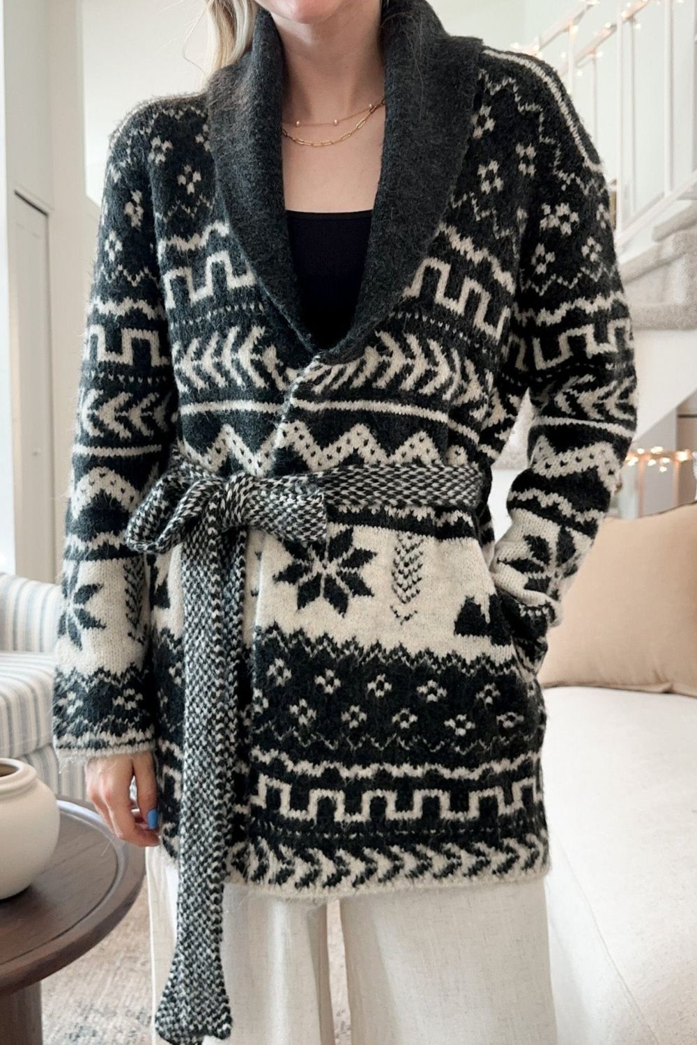 Black geometric jacquard wrap cardigan with shawl collar and belt