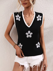 Black knit tank top with white daisy motif and contrast trim