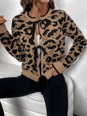 Tan leopard print acrylic knit cardigan with black tie-front detail