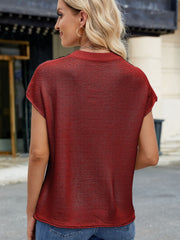 Burgundy knit cap sleeve top with vertical seams, crew neck, and casual fit.