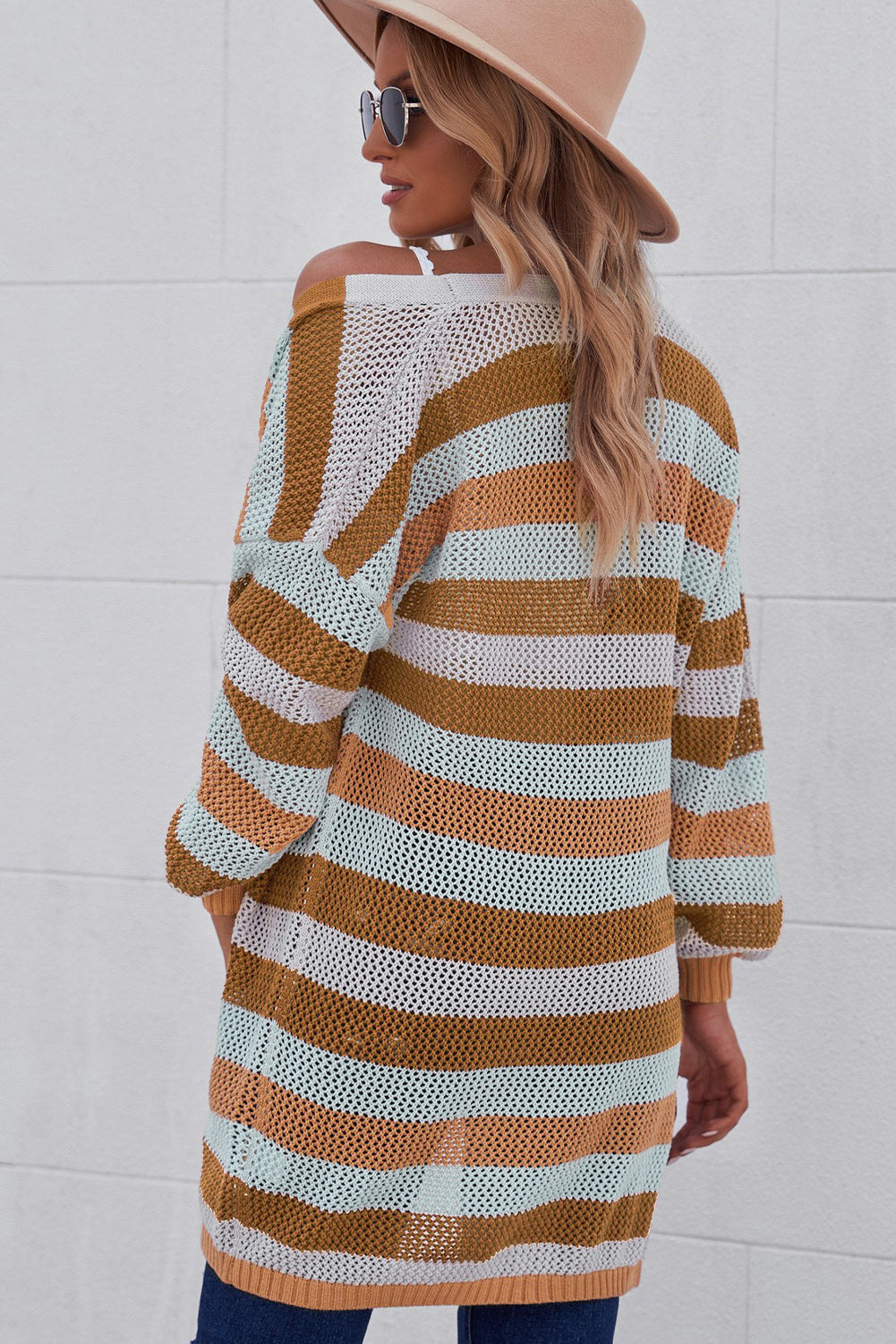 Horizontal stripe open knit duster cardigan in multicolor with a relaxed fit.