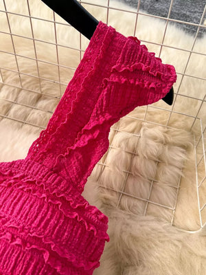 Textured rose red two-piece set with ruffled details and buttoned front.