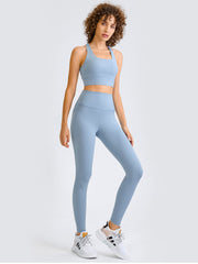Light blue sculpted racerback crop top with square neckline and matching leggings.