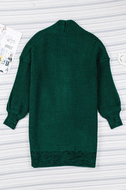 Textured puff sleeve open cardigan in Black Forest green acrylic with a waffle knit and shawl collar.