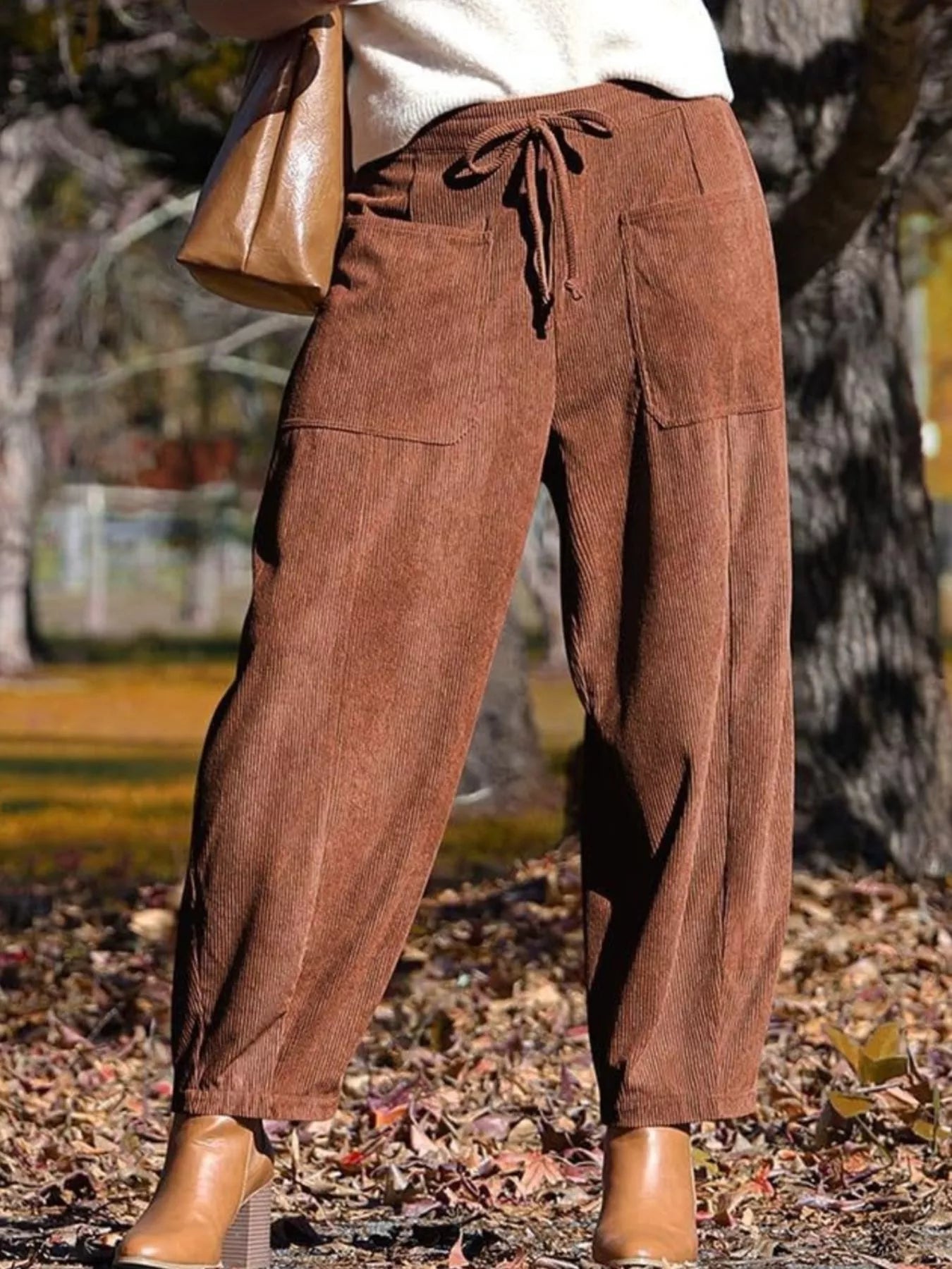 Brown corduroy wide-leg pants with drawstring waist and pockets