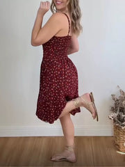 Charming floral print mini dress with smocked bodice and ruffle hem.