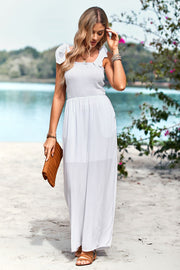 White smocked bodice tie-strap palazzo jumpsuit with pockets